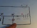 this is a 555 timer run imhotep relay charger. the charger is made to run quietly by using a simple oscillator circuit paired with the imhotep relay circuit.