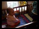 Baby Natalie play in crib with cousin Vanessa