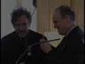 france bestowed top artistic honours to tim burton and marion cotillard on monday -- making them chevaliers des arts et des lettres. but while the us director called it his 