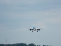 KLM 777-200 landing at 18R