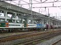 The freight train of the ED75 type heavy ream pulling leaves the station. The ED75 type was an electric locomotive for a standard exchange of Japan before. ED75 1028号機が牽引する重連の貨物列車が黒磯駅を発車