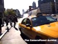 Police cars drive by women on street crying