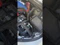 Installing the 2016 1.5 L Chevy Malibu battery hold down bracket with Skil brushless impact driver