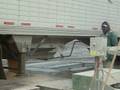videos de Drive over conveyor with 120' grain stacker