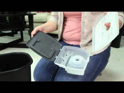 SmartClean Robotic Vacuum - Cleaning the Filter and Dirt Tank