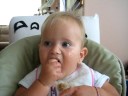 Ariella really enjoying her bannana Ariella really enjoying her bannana
