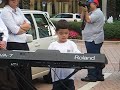 Ethan Bortnick playing piano Ethan Bortnick playing piano