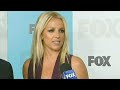 Simon Cowell says he charmed Britney Spears into becoming a judge on the X Factor. Report by Genelle Aldred. Like us on Facebook at www.facebook.com and follow us on Twitter at twitter.com
