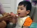 Nathanael Feeding Himself
