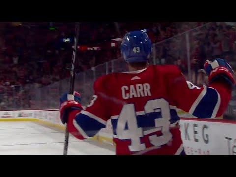 Video: Canadiens' Carr shoots puck off mask of Flames' Rittich and in