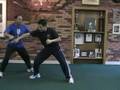 Guro Rick Tucci defends a straight thrust and foot sweeps.