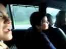 my retard sister singing like a loser and annoying me in the car going upstate