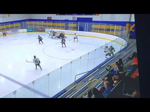 Chase Foy #14 with the assist against Shattuck St. Mary’s