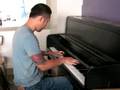 Sung Il plays piano 2.