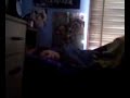 this is my mate sleeping and being hit with a pillow aroud the head!