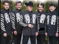Los tigres del norte La mesa del rincon Lyrics