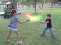 Jake and Julia fighting with lightsabers
