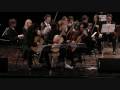 Trio Nahual and The Orchestra Accademia Musicale Naonis, directed by M° Alberto Pollesel play
Marco De Biasi CONCERTO PER TRE CHITARRE E ORCHESTRA

Dedicated to Leo Brouwer
Edited by Chanterelle Verlag Edition

Free Inspired from Marco De Biasi: Il confine dello spazio e del tempo e il suo doppio Acrilic on canvas, 120x120

World Premier: XIII Festival Chitarristico Internazionale del Friuli Venezia Giulia, Auditorium Concordia, Pordenone, Italia. 23 November, 2008

to look at a thing in the mirror means to inquire it, trying to gather it through  various aspects.
A same element can seem either in its male appearance, vigorous and passionate, or in the female one, growing and life-giving. There are aspects and details that can be felt only through a different perspective of research and through the reversal of the considered elements. Everything which exists cant be rejected, but transformed in a progressive way, either extended or reduced, and always preserving the identity of each elements.
Space and time are nothing but two sides of the same coin and what separates them is the boundary in which action is sovereign. The boundary of space and time, where the elements meet, is the spot in which man has the power to choose what will become matter of the world that he gets ready to build

The Concerto Per Tre Chitarre e Orchestra was commissioned by XIII Festival Chitarristico Internazionale del Friuli Venezia Giulia.

Solists
TRIO NAHUAL
Mauricio Gonzàlez
Josué Gutiérrez
Rodrigo Herrera


http://trionahual.spaces.live.com/ Trio Nahual 
http://www.marcodebiasi.info/ Marco De Biasi  
http://www.chanterelle.com/ Chanterelle Verlag Edition
http://www.farandola.it/ Festival Internazionale Chitarristico del Friuli Venezia Giulia
