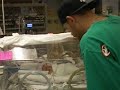 Zoey Petitt with Daddy in the NICU
