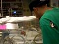 Zoey Petitt with Daddy in the NICU