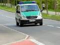 Polizei, Krankenwagen und Oldtimer
