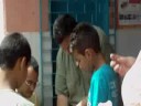 Tony & JP teaching thumb trick to brazilan boy-2