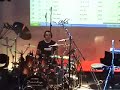 it's playing my song g-strings, a very funky rock song. it was a drum clinic and we used 48 microphones for live presentation