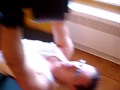 Georg is training his arms with heavy barbells
