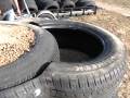 Earthship How To bolt in half tires for spacer block
