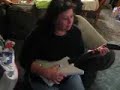 mom playing guitar hero