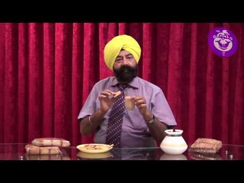 How to eat ATTA BISCUITS ??? Tutorial by Jaspal Bhatti - YouTube