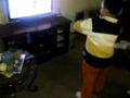 raymond playing nintendo wiii the smurfs game this is angel big brother funny!!!!