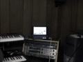Another demonstration of the Atom Netbook platform doubling as a compact, portable music studio. As long as you don't overdo the heavy DSP effects (Reverb, Granular Synthesis, etc) it will do quite nicely. In this demo, Reason 4 is acting as a big rack full of virtual outboard gear, and the modules are being triggered via MIDI by the sequencer in the Ensoniq TS-10 under the Axiom. The AA1 happens to be sitting on a rack full of physical gear so you can see the obvious benefit of a small virtual studio running inside the Netbook. The song is another quick sequence I threw together for this demo. Yes it sounds like prog rock meets MOD file meets keygen. Next time I'll do a Lawrence Welk cover.