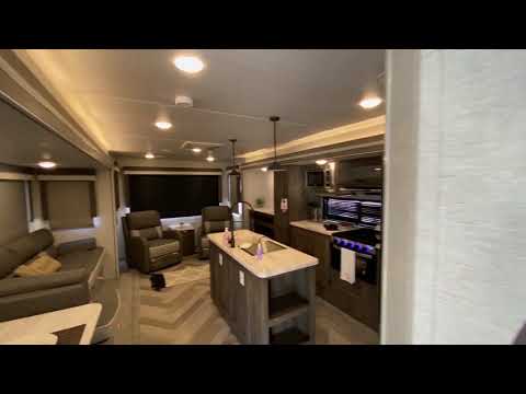 Thumbnail for The 32RET Wildwood offers a couple's coach w/ rear entertainment and East to West master bed! Video