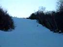 my friend dan boarding down a hill in nh