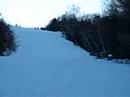 my friend dan boarding down a hill in nh