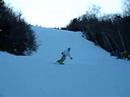 my friend dan boarding down a hill in nh