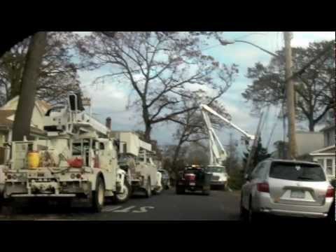 in queens - Sandy's Afermath in Queens village, NY. Con Edison and T & D Solution from Texas are working to bring electricity back to Queen village. My neighbors are ver...