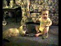 Baby laughing at cat