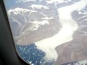 gletsjer op groenland gezien uit martinair vliegtuig