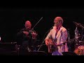 noel paul stookey of peter paul and mary and violinist doug cameron perform noel's compositon, megumi, a song about a young girl abducted by the north koreans.
