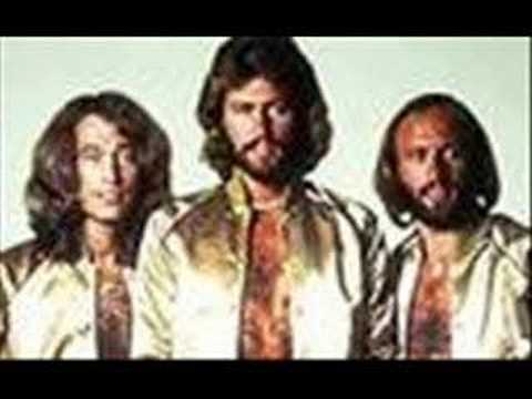 Saturday Night Fever - heres the words have fun singing along Listen to the ground: There is movement all around There is something goin' down And I can feel it On the waves of the...