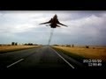 Video: Russian Fighter Jet And Helicopter Buzz Over Highway