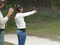 Christa shooting the poppers