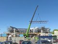 Roof trusses lowered onto the SMPCCC