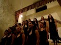 greenwich academy madrigal singers on tour in santorini, greece - june 2008.

blend sounds a little off from the video because obviously some of the girls are closer to the camera than others...