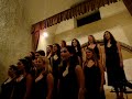 greenwich academy madrigal singers on tour in santorini, greece - june 2008.

blend sounds a little off from the video because obviously some of the girls are closer to the camera than others...
