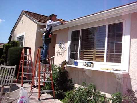 how to fasten gutters