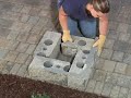 How to build a concrete post using stackable blocks How to build a concrete post using stackable blocks