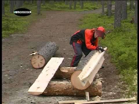 Chainsaw - Stihl chainsaw on a portable sawmill from Logosol cutting boards from a log, just like an Alaskan mill. The adventage is that you not only get rough edged bo...